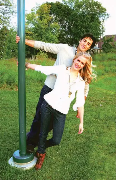  ??  ?? Kaitlyn Weaver and Andrew Poje take some rare time off to relax. The pair train at the Detroit Skating Club,                                                                                                                                                                                                  