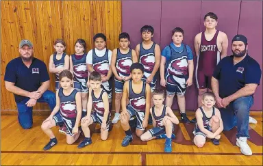  ?? Randy Moll/Westside Eagle Observer ?? The GYO maroon team posed for a photo before Saturday’s wrestling tournament in the Carl Gym on Saturday.