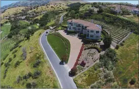  ??  ?? The custom estate sits high atop a hilltop in San Jose’s exclusive and private Silver Creek Valley Country Club.