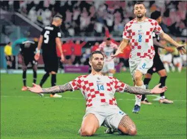  ?? AFP ?? Croatia's Marko Livaja celebrates after scoring his team's second goal against Canada in their Group F match on Sunday.