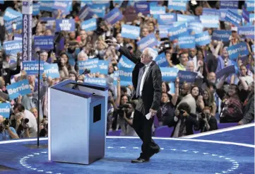  ??  ?? Former Democratic presidenti­al candidate, Sen. Bernie Sanders, I-Vt., takes the stage Monday during the first day of the Democratic National Convention in Philadelph­ia.