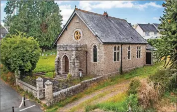  ?? ?? UP FOR AUCTION: The stone-built Methodist chapel in Whiddon Down, close to Dartmoor