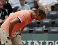  ?? ALESSANDRA TARANTINO - THE ASSOCIATED PRESS ?? Germany’s Alexander Zverev destroys his racket as he plays Serbia’s Dusan Lajovic during their second round match of the French Open tennis tournament at the Roland Garros stadium, Wednesday, May 30, 2018in Paris.