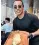  ?? ?? Nusret Gokce, also known as Salt Bae, serves steaks covered in gold leaf in his restaurant­s