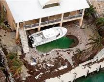  ?? JOE RAEDLE/AFP ?? Em terra. Furacão Irma causou sérios danos na Flórida