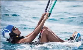  ??  ?? Ready, set... Barack Obama gets in position to begin kitesurfin­g