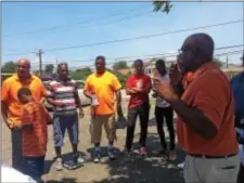  ?? KATHLEEN CAREY – DIGITAL FIRST MEDIA ?? Ken Boston addresses the group before walking in Chester Saturday.