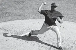  ?? JONATHAN DANIEL GETTY IMAGES ?? Starting pitcher Sixto Sanchez had six strikeouts and only gave up four hits in five strong innings to help the Marlins sweep the Cubs at Wrigley Field on Friday.