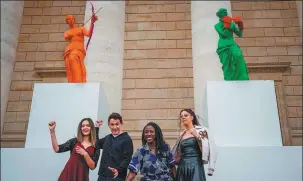  ?? Right: French artist DIMITAR DILKOFF/ AFP ?? Laurent Perbos (second from left) poses with French athletes in front of his sculptures reflecting various sports from the Paris Games at the city’s National Assembly on April 2.