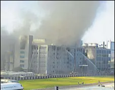  ?? SHANKAR NARAYAN/HT ?? Fire officials try to douse a blaze at the Serum Institute of India in Pune on Thursday.