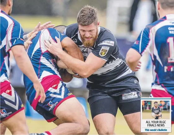  ?? Picture: JERAD WILIAMS ?? Tweed Heads' Mitchell Sharp charges into Runaway Bay rivals in Rugby League Gold Coast finals action.