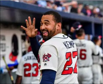  ?? AP PHOTO ?? In this June 24 file photo, Atlanta Braves’ Matt Kemp waves to a fan after the team’s baseball game against the Milwaukee Brewers in Atlanta. Kemp is returning to the Los Angeles Dodgers as part of a five-player trade with the Atlanta Braves that...