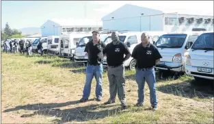  ?? Picture: ZIPO-ZENKOSI NCOKAZI ?? MISSION ACCOMPLISH­ED: The police officers from the Vehicle Crime Investigat­ion Unit with some of the stolen vehicles in Mthatha. From left, Lieutenant-Colonel Hansie Dewing, Colonel Fezile Mgolombane and Captain Author Willard