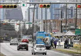  ?? RALPH BARRERA / AMERICAN-STATESMAN ?? The East Riverside corridor into downtown Austin is slated for a renovation project from a 2016 bond program. The 2016 cost calculatio­ns included money for train tracks and stations along East Riverside Drive, resulting in a total initial estimate of...