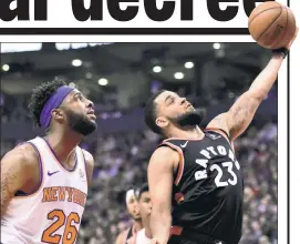  ?? AP ?? DIDN’T GET THIS ONE: Mitchell Robinson watches Fred VanVleet go up for a layup Monday night in Toronto. Robinson tied Patrick Ewing’s rookie record by blocking a shot in his 28th straight game.