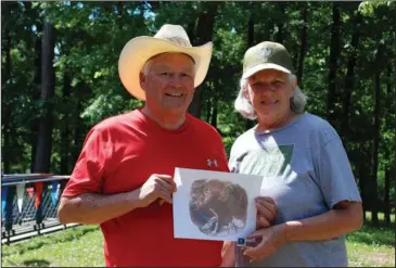  ?? Submitted photo ?? CRATER OF DIAMONDS: Wendell Fox, left, from Joliet, Mont., recently found a 2.78-carat diamond while surface searching at Crater of Diamonds State Park with his wife, Jennifer. The diamond is the second-largest gem registered at the park so far this...