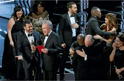  ?? PHOTO: REUTERS ?? Jimmy Kimmel and Warren Beatty laugh after correcting the Best Picture Oscar from La La Land to Moonlight.