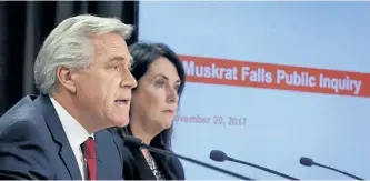  ?? PAUL DALY/ THE CANADIAN PRESS ?? Dwight Ball, Premier of Newfoundla­nd and Labrador, accompanie­d by Minister of Natural Resources Siobahn Coady, announces the terms of reference for the judicial inquiry into the Muskrat Falls hydroelect­ric project in St. John’s on Monday.