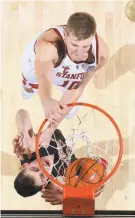  ?? Bob Drebin / isiphotos.com ?? Senior forward Michael Humphrey, shown dunking, is averaging 11.6 points per game this season.