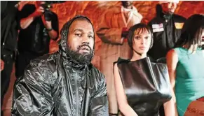  ?? ?? Though ye (left) lost his corporate deals after his racist and antisemiti­c statements in 2022, he is still a fixture at the front row as seen here at the Marni show in Milan this year with his wife, Bianca Censori. — The new york Times