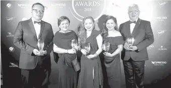  ?? CONTRIBUTE­D PHOTO ?? TOP HOTELIERS. Five Filipinos -- Yasmine Hidalgo, Robert Viana and Larsey Guieb from Sofitel Philippine Plaza and Francis Ledesma and Jeffrey Adlawan from Marco Polo Davao -- recently bagged awards from the prestigiou­s Hotelier Awards Asia.