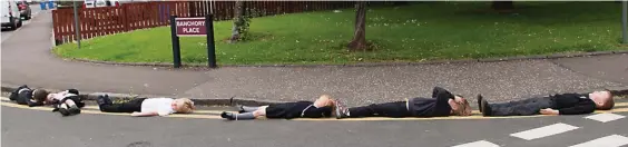  ??  ?? Shock tactics: Youngsters from Banchory Primary School in Alloa ‘play dead’ for the road safety campaign devised by the parents