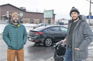  ?? DAVE STEWART • THE GUARDIAN ?? Mike Hogan, left, co-owner of Upstreet Craft Brewing, and Dieter Friesen are calling on the City of Charlottet­own to make safety enhancemen­ts at the Allen Street-Walthen Drive crosswalk. Hogan and Friesen also live in the area.
