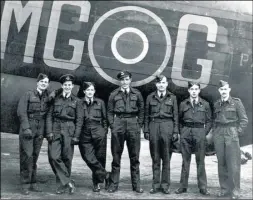  ??  ?? Thousands from Bomber Command receive the Bomber Command Clasp. Here, a Lancaster bomber with crew members from No 90 Squadron