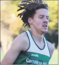  ?? ?? Carraig na bhFear AC’s Daire O’Sullivan racing in the junior (U20) race at national cross country championsh­ips in Santry last Sunday. Daire medalled with Cork in the county team competitio­n.