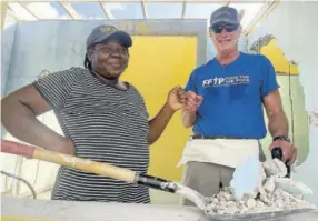  ?? ?? The synergy between the school community and donors was contagious as depicted in this photo with donor Craig Ruppert and a member of the community.