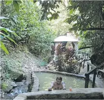  ?? LARISSA LIEPINS/FOR POSTMEDIA NEWS ?? The natural sulphur springs at Tia’s — ‘be careful’ and rum punch go hand in hand at this gorgeous location. A visit is $5 US.