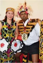  ?? — PETER LURUTHUDAS­S ANNANIAH ?? Maria is wearing a traditiona­l Kenyah outfit, while Peter is dressed in a Sarawakian warrior’s costume.