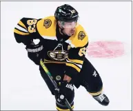  ?? Charles Krupa / Associated Press ?? Boston Bruins center Brad Marchand skates during the first period of an NHL preseason game on Wednesday in Boston.