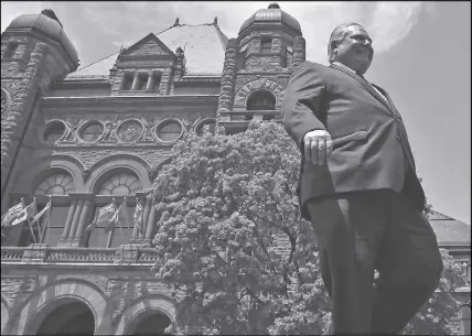  ?? CP PHOTO ?? Ontario premier-elect Doug Ford is shown on the front lawn of the Ontario Legislatur­e at Queen’s Park in Toronto.