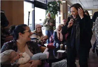  ?? AP PHOTOS ?? MEET, GREET: U.S. Sen. Kamala Harris brings her presidenti­al campaign to Gibson’s Bookstore in Concord, N.H., on Monday, in her first trip to the state since declaring her candidacy for the Democratic nomination for president.