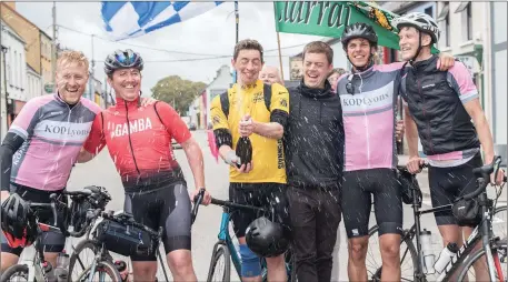  ?? Left to right: Photo by Christy Riordan ?? Matthew De Courcy, Colin O’Brien, Eoghan and John O’Sullivan, Colin Walsh and Aidan Walsh arriving in Cahersivee­n following their fundraisin­g cycle from Dublin to Kerry for MASI (The movement of Asylum Seekers in Ireland).