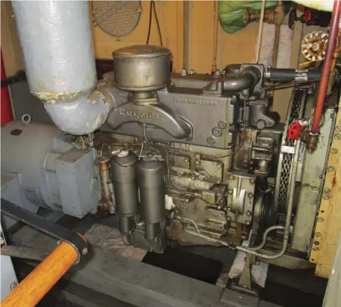  ??  ??  Still serving! Built in July of 1944, this Cat D3400 diesel has been aboard the SS Red Oak Victory since the ship was commission­ed and currently has 683 hours on the clock. This generator set differs significan­tly from the 34-15 AC (Alternatin­g...