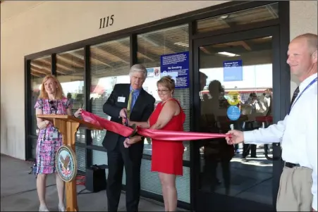  ?? WILLIAM ROLLER PHOTO ?? Dignitarie­s and officials celebrate the ribbon-cutting ceremony of the Veterans Affairs San Diego Healthcare System Imperial Valley clinic on Friday.