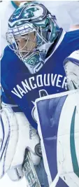  ?? DARRYL DYCK/THE CANADIAN PRESS FILES ?? Vancouver Canucks' goalie Ryan Miller makes a save against the San Jose Sharks last season. Starting this season, NHL goalies will be will wearing equipment better suited to body size with strict new enforcemen­ts coming into place. However, the...