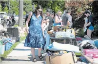  ?? THE HAMILTON SPECTATOR FILE PHOTO ?? City staff have been working with the community and residents who have agreed this is not the year to host the annual Beach Strip Garage Sale.