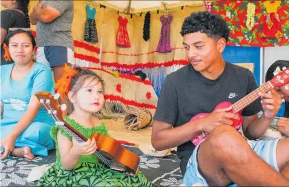 ?? ?? Playing the ukulele during Pasifika Celebratio­n Day 2023 in Levin.