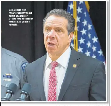  ??  ?? Gov. Cuomo tells reporters Friday about arrest of an Ulster County man accused of making anti-Semitic remarks. DARREN MCGEE/OFFICE OF GOVERNOR ANDREW M. CUOMO