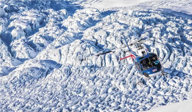  ?? PHOTO: SUPPLIED/TTL ?? A Totally Tourism helicopter at Franz Josef Glacier.