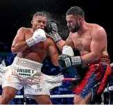  ?? ?? Joseph Parker, right, dealt out damage of his own in his fight against Joe Joyce.