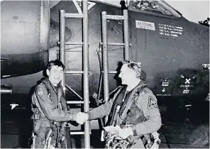  ??  ?? Price, right, with his navigator following his final flight in a Buccaneer