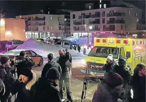  ?? Picture: REUTERS ?? SHOOTING SCENE: An ambulance is parked at the Quebec Islamic Cultural Centre in Canada, where six people were shot and killed on Sunday