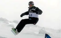  ??  ?? Raubenheim­er competing in the Snowboard Cross Adaptive Standing Men event at the Winter Games in Wanaka in 2011.