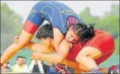  ?? FOR REPRESENTA­TION ONLY ?? Girls busy in a wrestling bout.