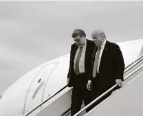  ?? Anna Moneymaker / New York Times ?? President Donald Trump and Attorney General William Barr leave Air Force One. The Justice Department has sued Google.