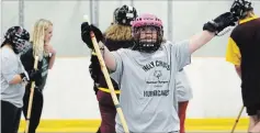  ?? CLIFFORD SKARSTEDT EXAMINER ?? A Holy Cross player celebrates a goal score on St. Peter during Special Olympics floor hockey qualifier action on Thursday at the Evinrude Centre.